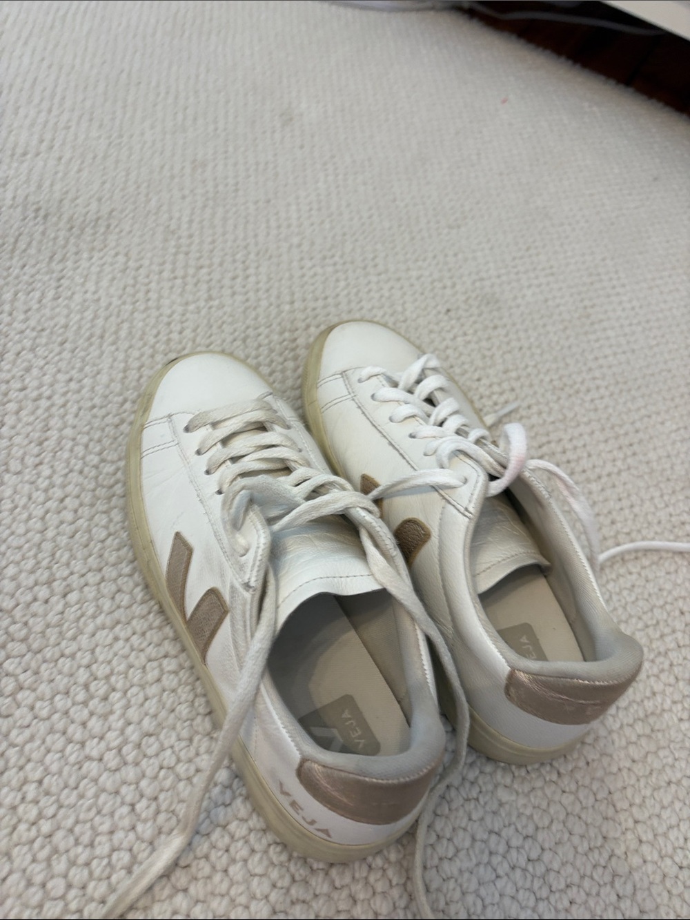 Veja Women’s White Sneakers with gold accents